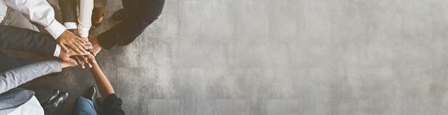 Team celebrating successful business goals